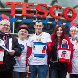 Tesco store red jeans